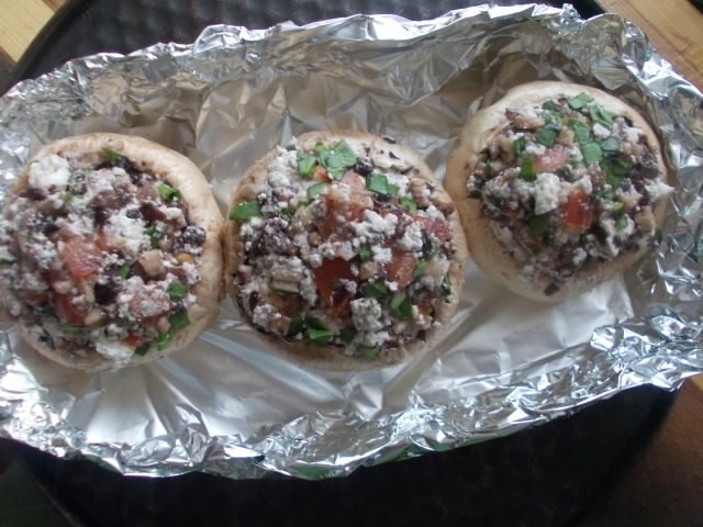 Stuffed mushrooms with cheese and tomato
