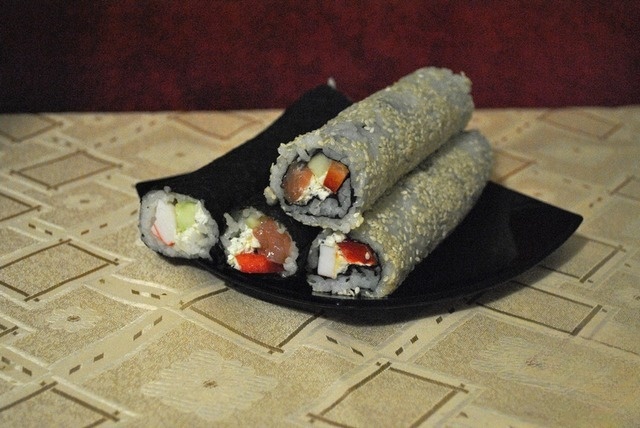 Homemade rolls and nigiri sushi