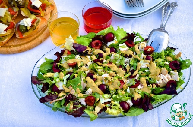 Chicken salad with cherries and curry sauce