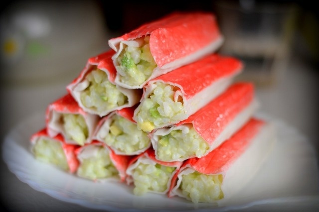 Crab sticks, stuffed with rice and avocado