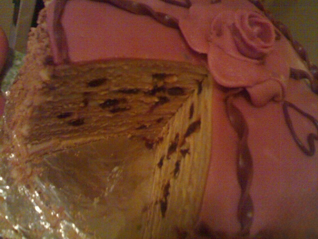 Honey cake with custard and prunes