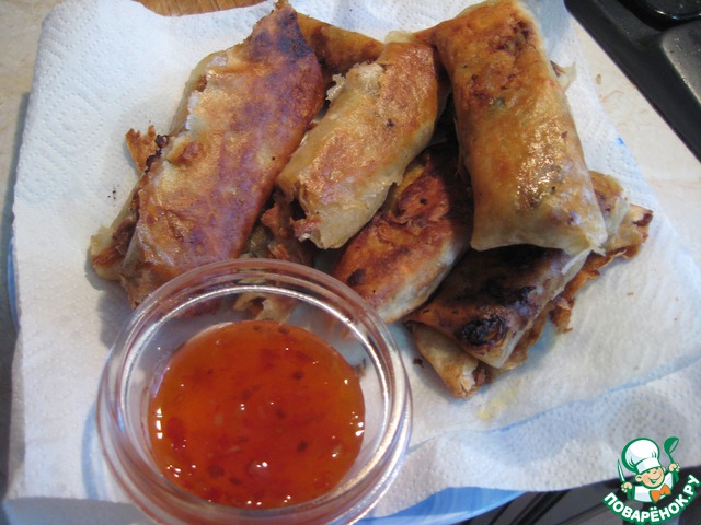 The dough for spring rolls and Chinese spring rolls with meat and mushrooms