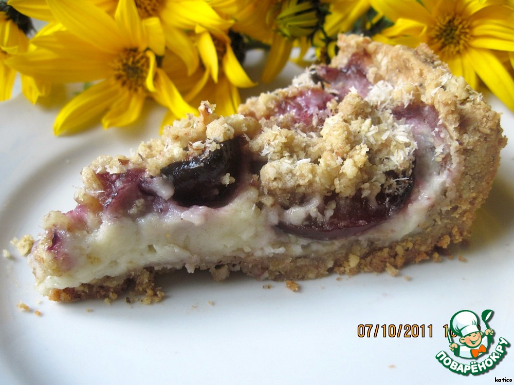 Pecan pie with coconut cream and plums