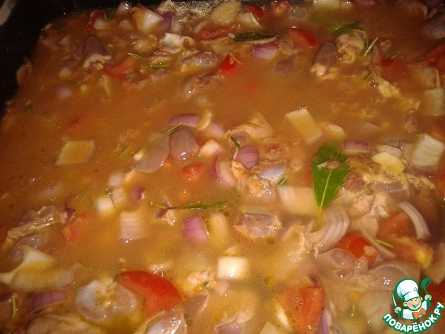 Chicken giblets with tomatoes and rosemary in the oven