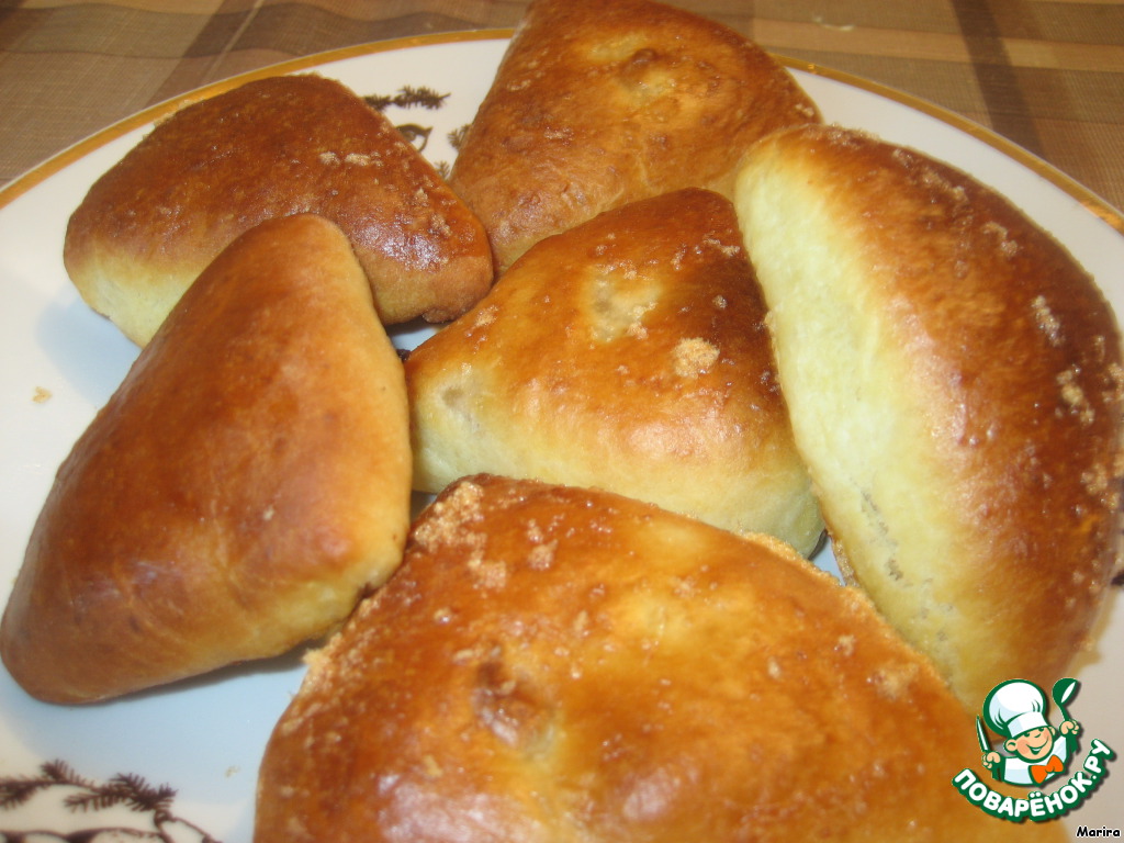 Cakes with dried apricots and cabbage. Cinnamon rolls