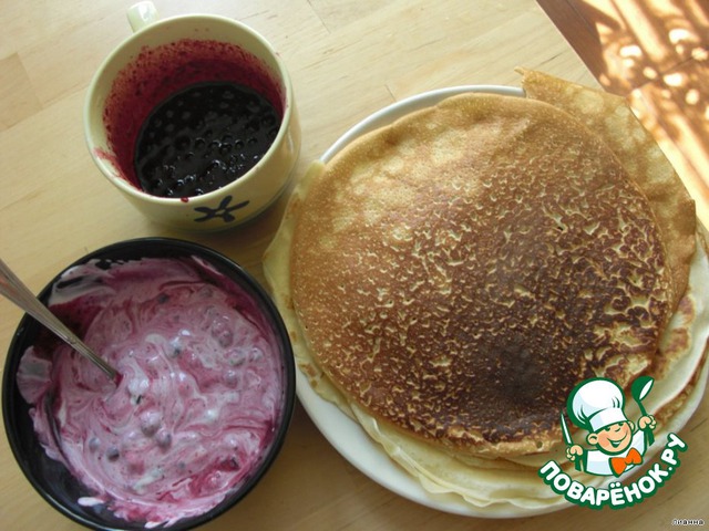 Pancakes with blueberry sauce