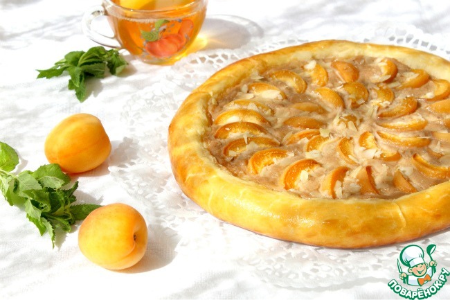 Apricot pie on bread dough