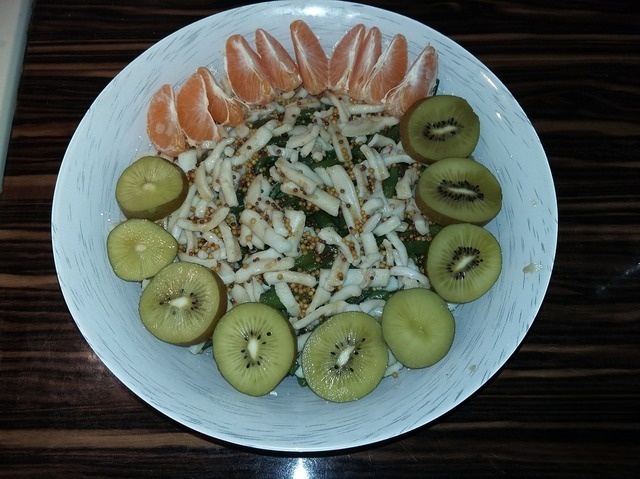 Salad with squid, mushrooms and vegetables