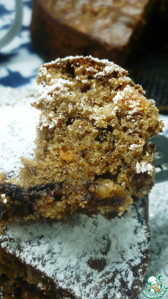 Cake with prunes, dried apricots, nuts and chocolate