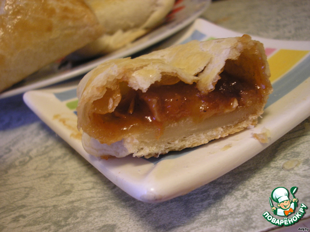 Puffs with apricot jam and brie cheese