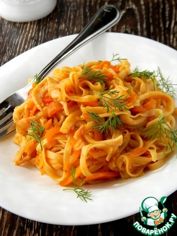 Pasta with vegetables and squid