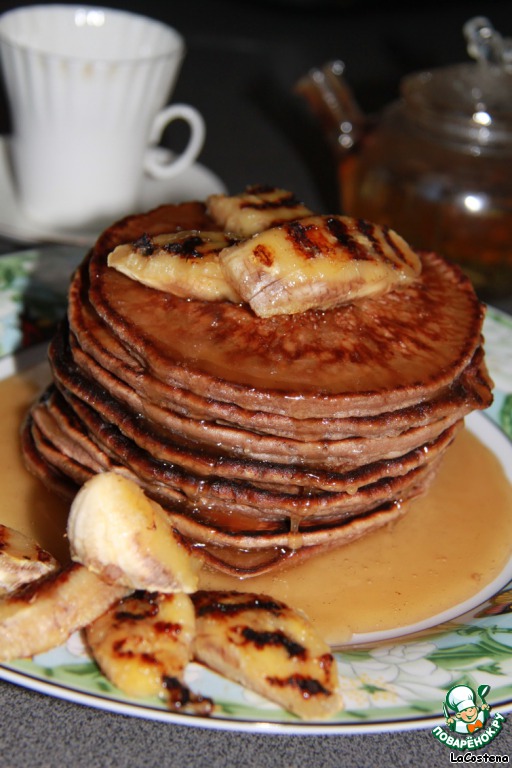 Chocolate pancakes with banana and caramel