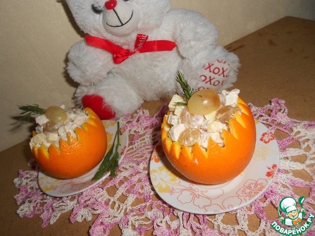 Salad in orange baskets