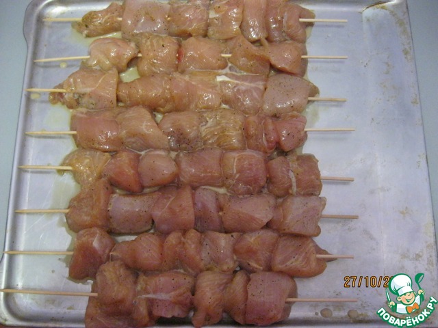 Chicken kebab on skewers in the oven