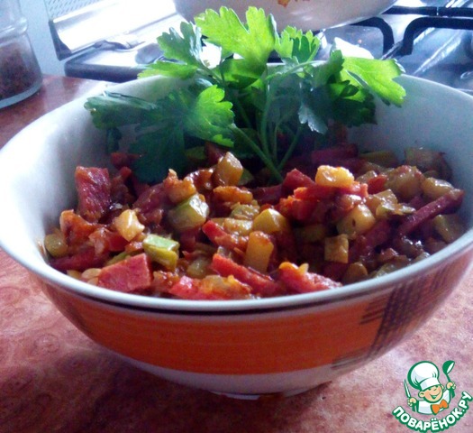 Hot salad with zucchini and sausage