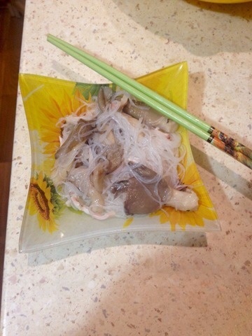 Salad with funchoza, oyster mushrooms and squid