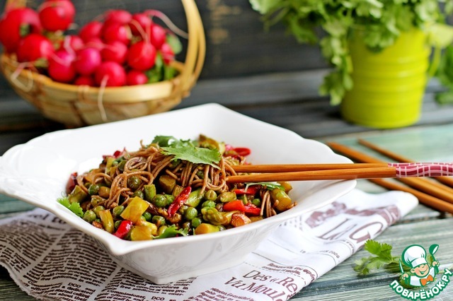 Warm salad with buckwheat noodles and vegetables