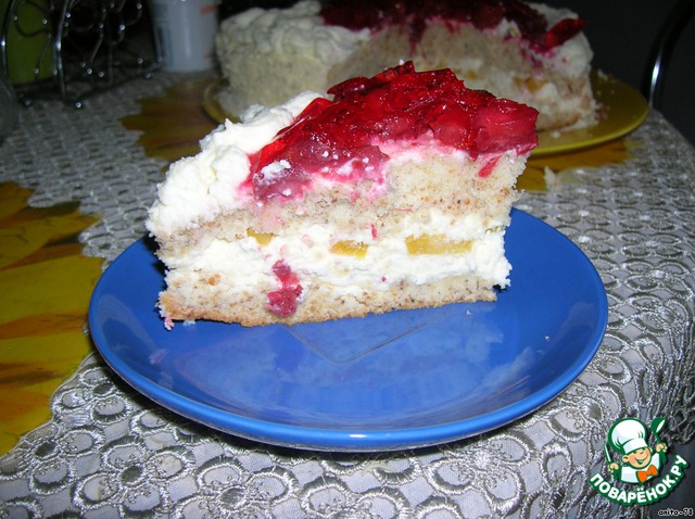 Almond cake with strawberries, mango and whipped cream