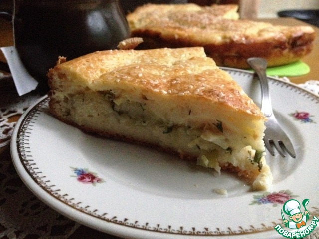 Filler pie with young cabbage