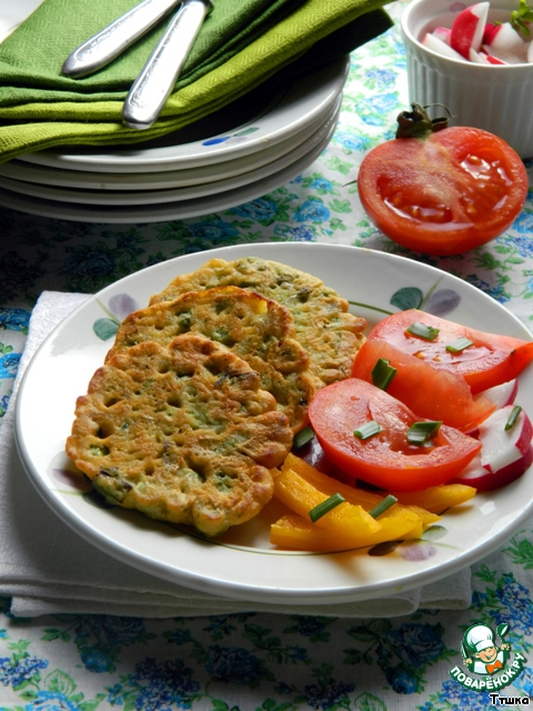 Fritters of chickpea flour with green peas (vegetable )