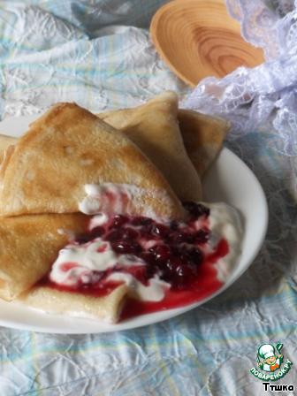 Ruddy pancakes with sour cream