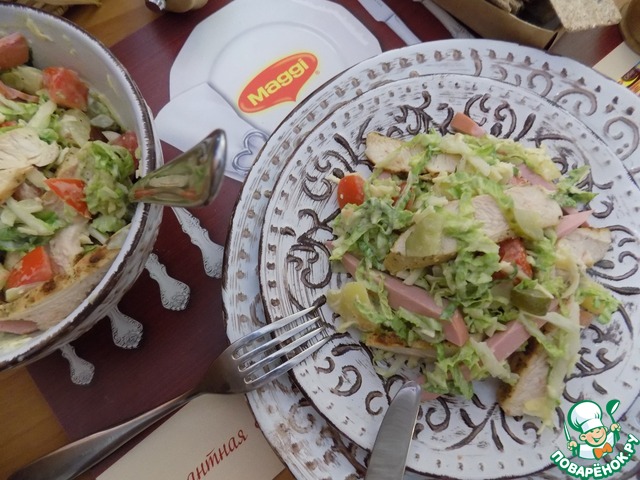 Salad with chicken, ham and vegetables