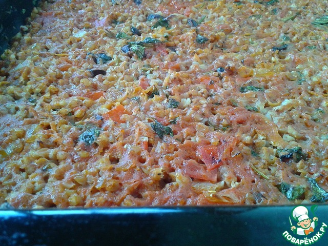 Buckwheat porridge with vegetables on the baking sheet