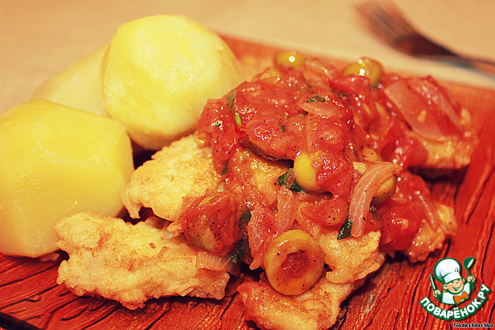 Fish in tomato sauce with olives