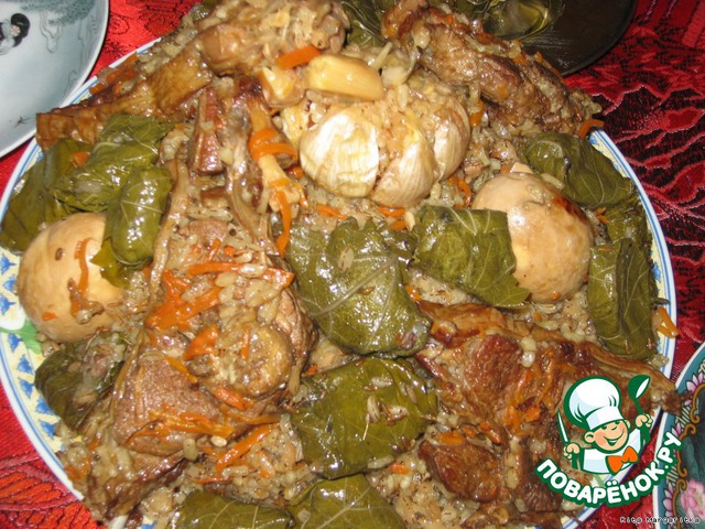 Pilaf with stuffed vine leaves in markilinski