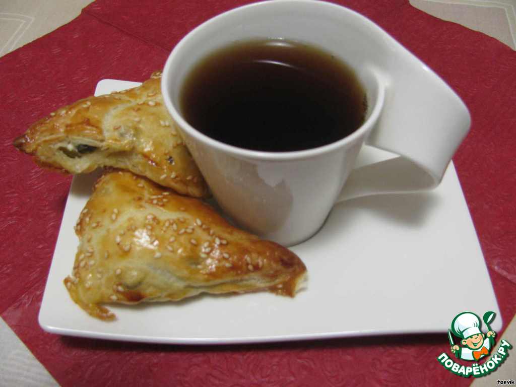 Pies puff pastry with feta cheese and olives