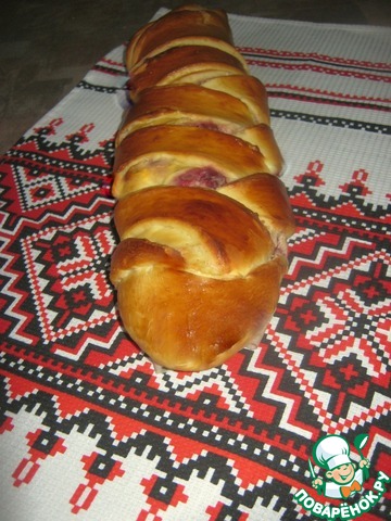 Cheese plait with cherry