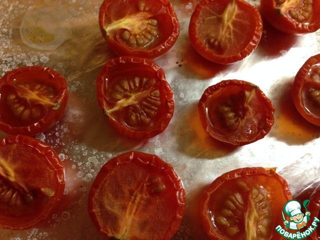 Homemade bread with olive oil, herbs and tomatoes