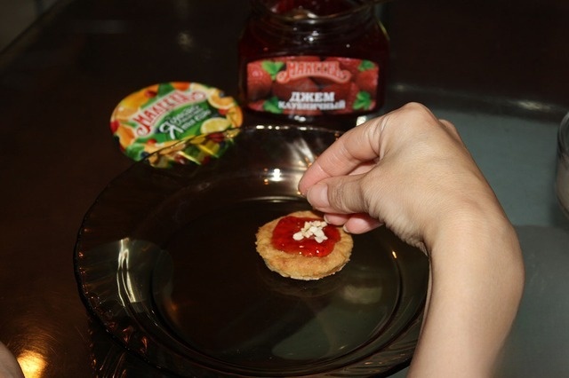 Potato biscuits with jam and nuts