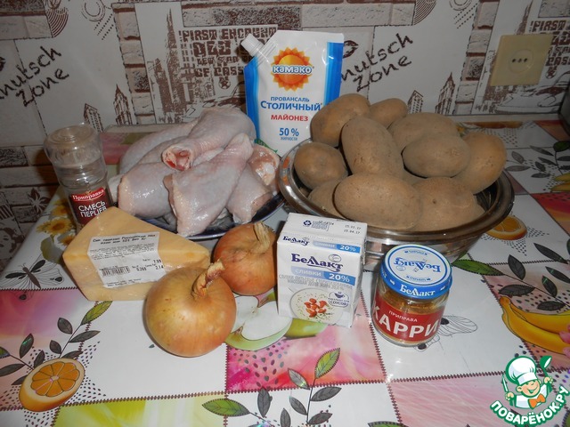 Chicken drumsticks with potatoes under cream
