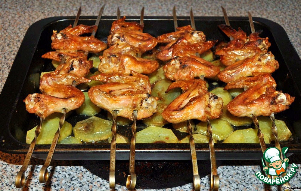 Skewers of chicken wings