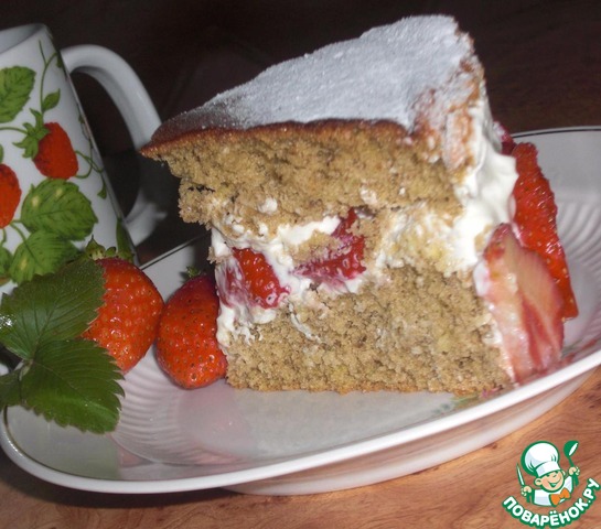 Chocolate cake with sour cream and strawberries