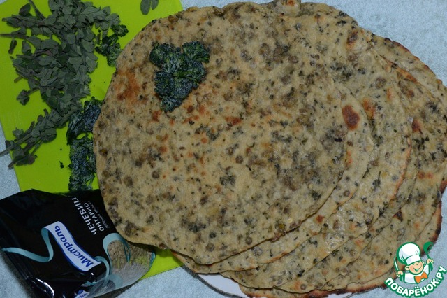 Besan roti-bread with lentils on the Indian motives