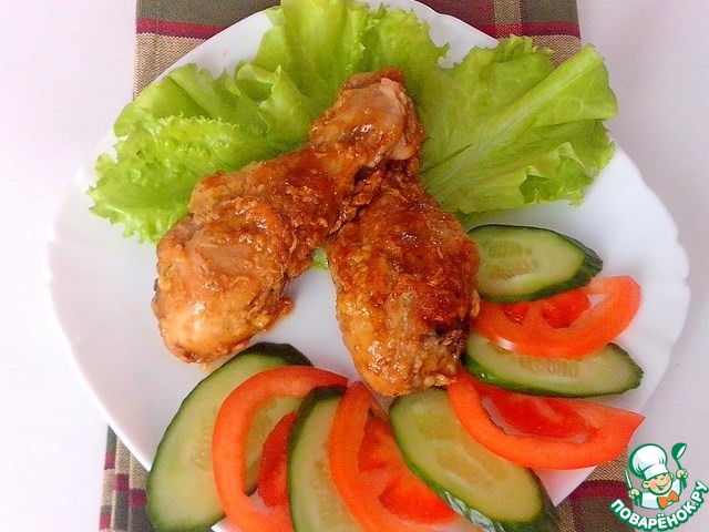Chicken drumsticks baked in spicy sauce