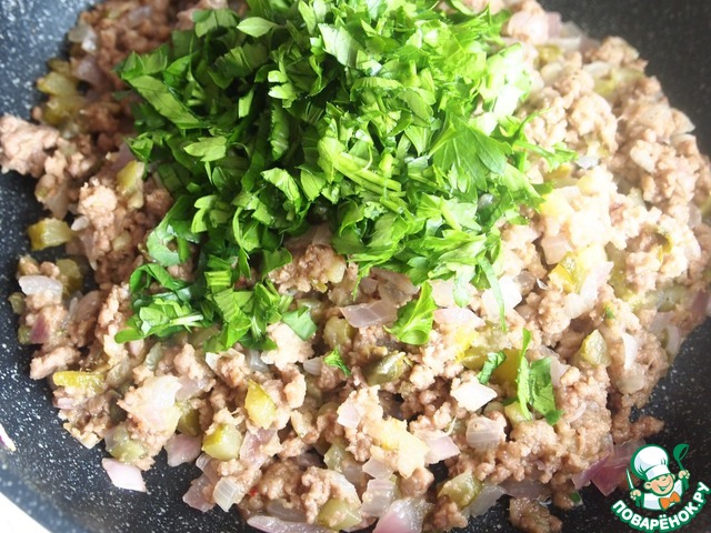 Hot meat tartare on a bed of buckwheat