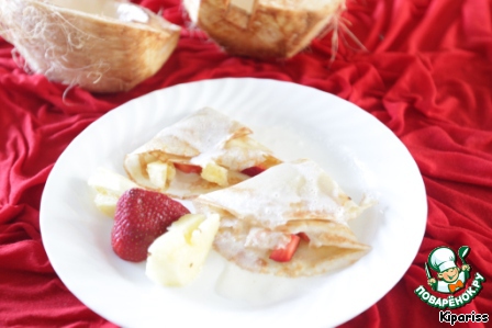 Coconut pancakes with pineapple and strawberries