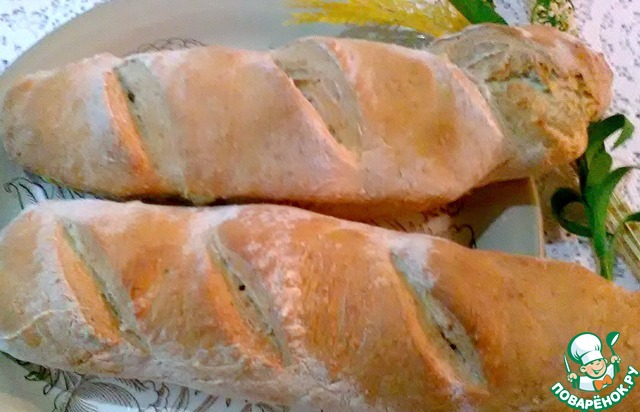 A loaf of rye bran and sesame seeds