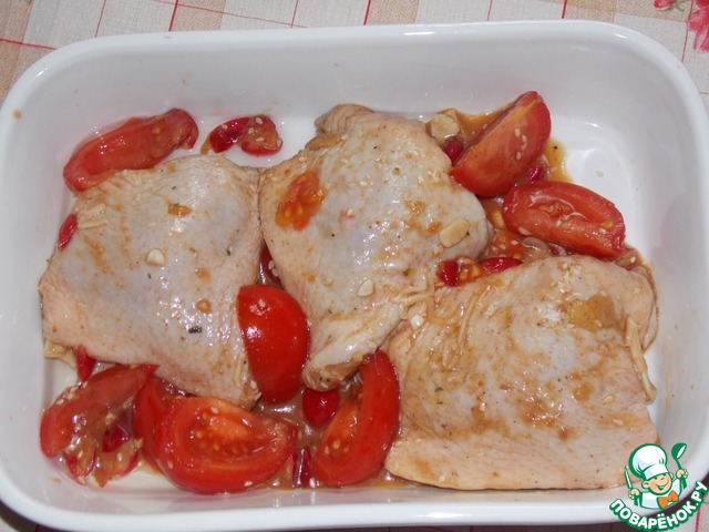 Chicken baked with tomatoes and cherries