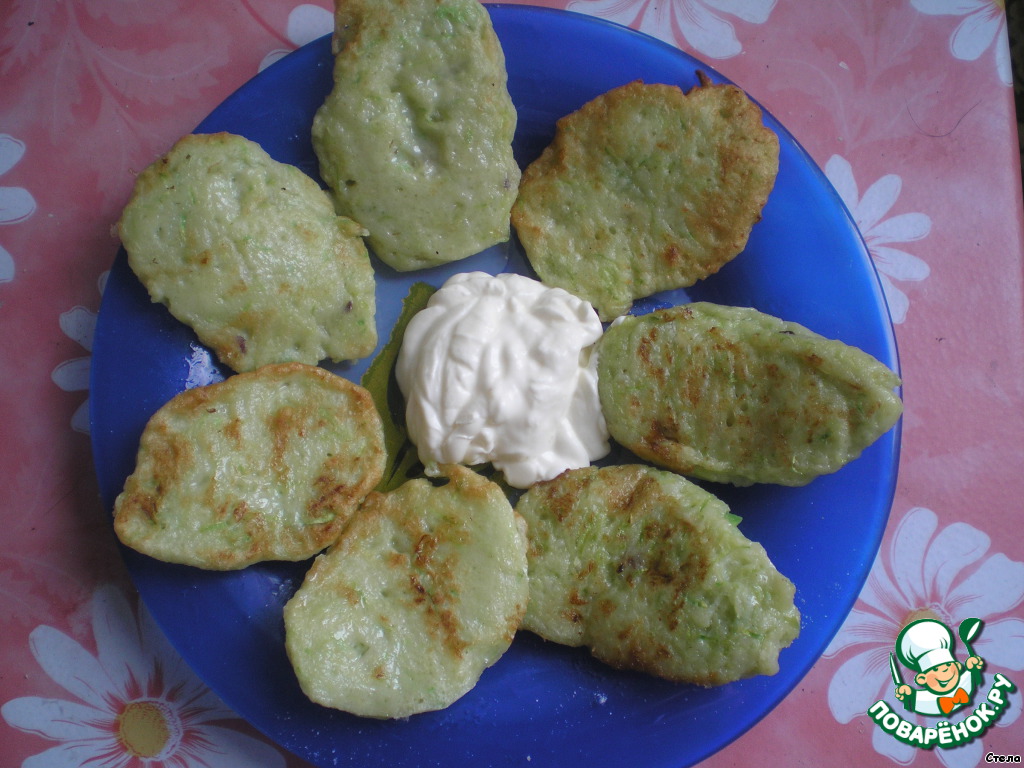 Pancakes from zucchini, potatoes and onions