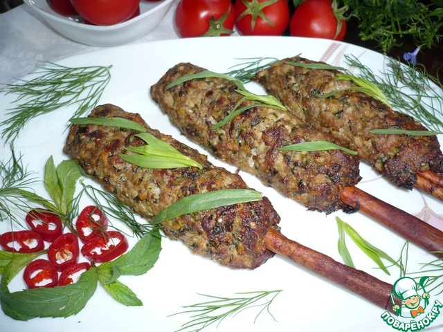 Kebab on skewers made of cinnamon sticks