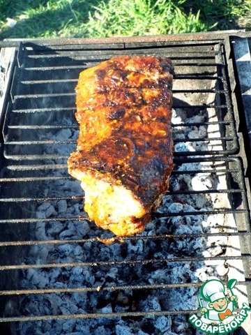 Ribs grilled with homemade BBQ sauce