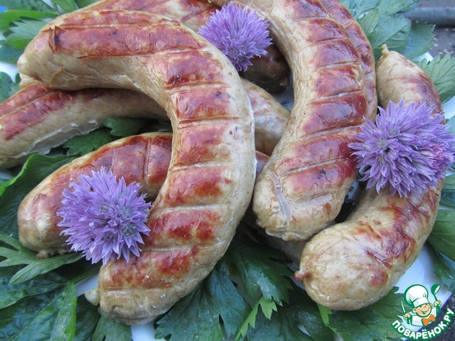 Homemade sausages on the coals