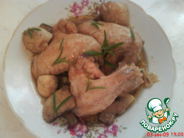 Chicken with onions and mushrooms in red wine