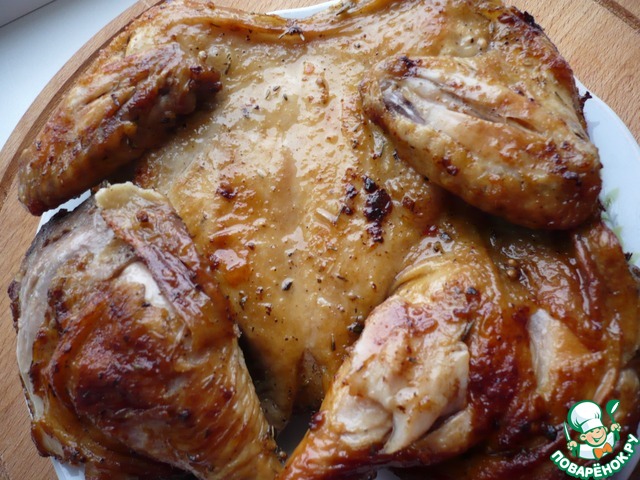 Chicken on the grill with seasoning for chicken