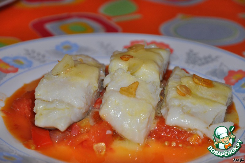 Cod with sauce pil-pil on a bed of vegetable g