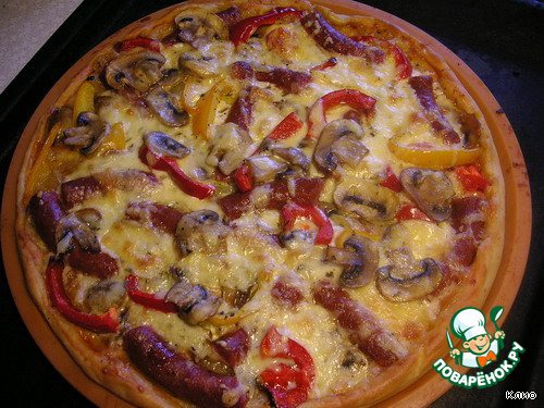 Pizza with mushrooms, smoked sausages and peppers